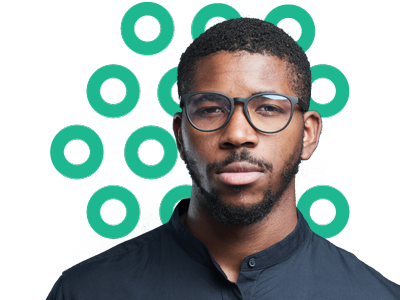 A Black man in glasses is super imposed over the company logo.